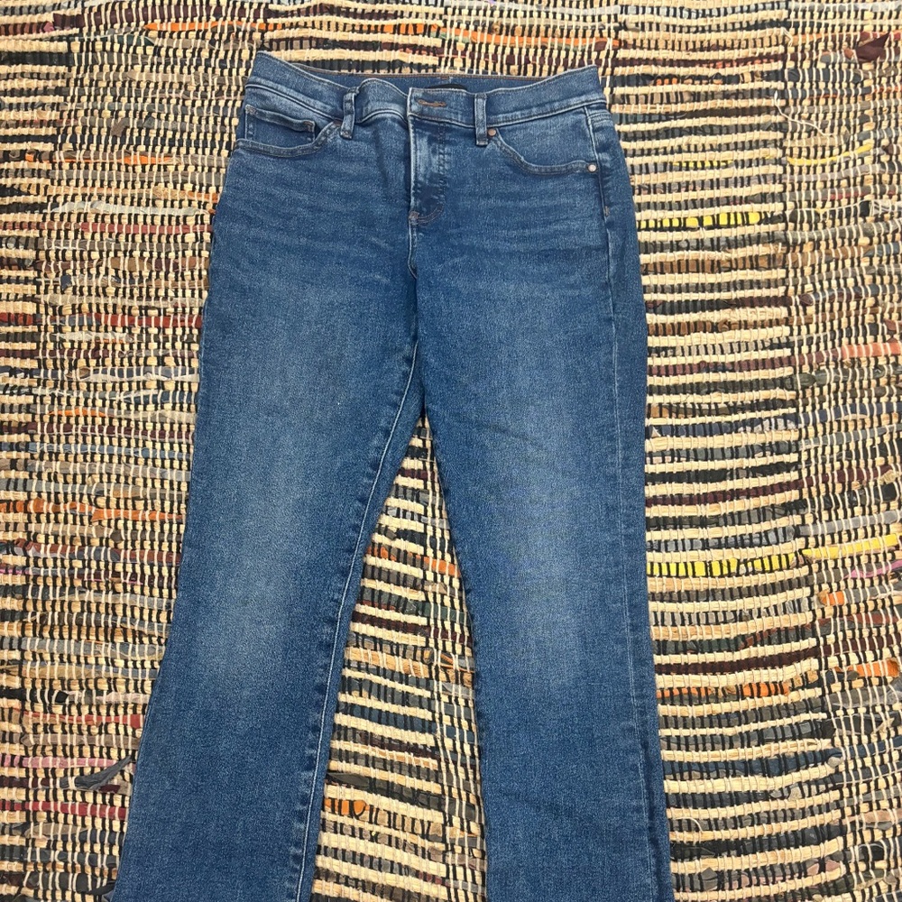 Dark wash small flared jeans with tiny slits on the bottom||Express